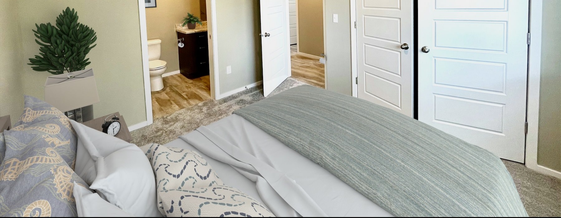 a bedroom with a large bed and closet