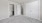 a bathroom with white cabinets