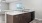 a kitchen island with a marble countertop